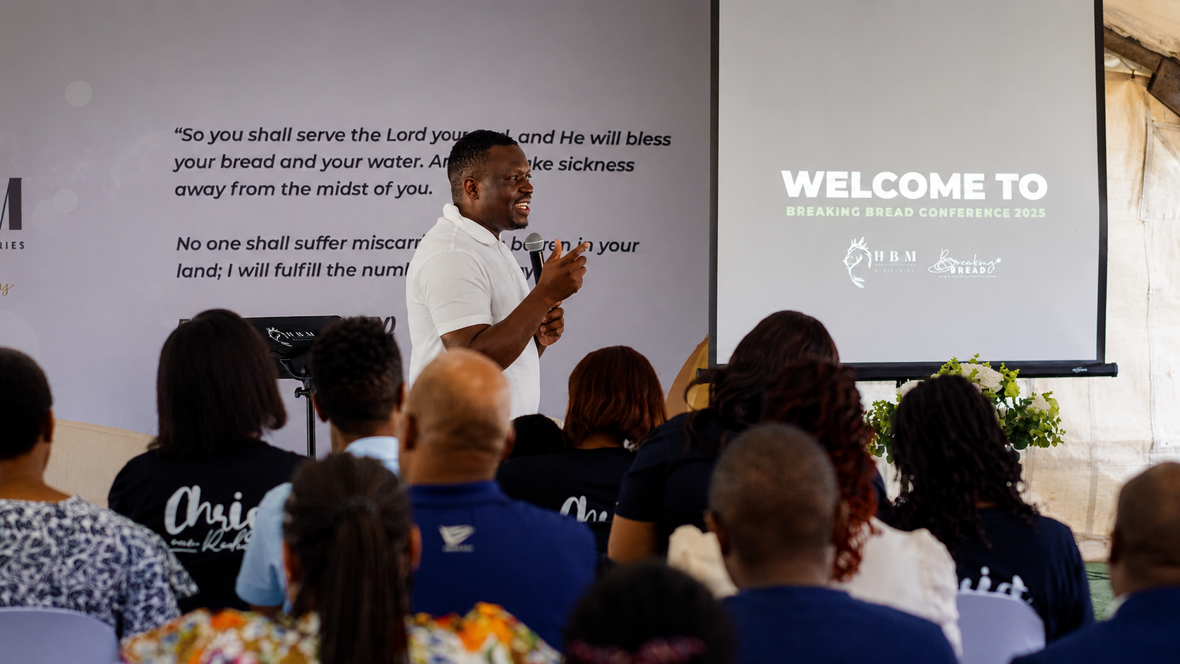 Pastor preaching at the Breaking Bread Conference gathering of House of Bread Ministries